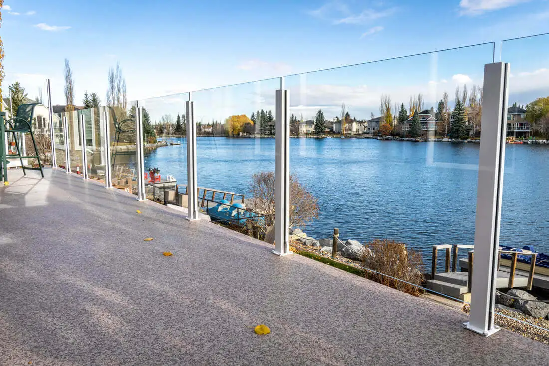 DeckRite membrane deck beside lake with railing
